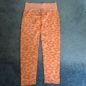 NVGTN Peach Orange Leopard Knit Leggings